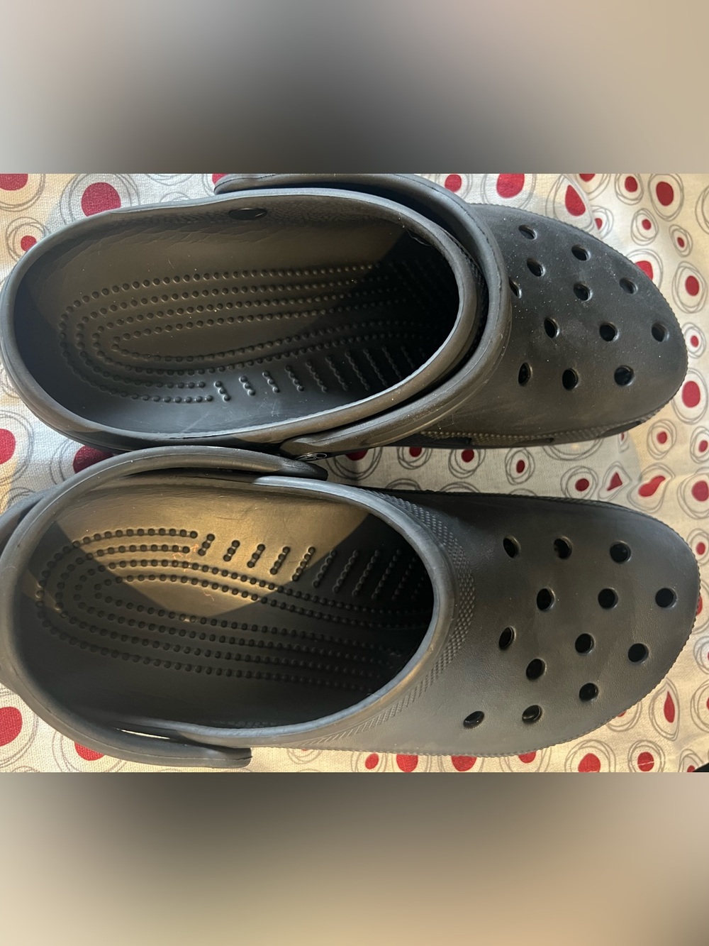 CROCS Black Slip-On Clog. Size 12.  One tiny Nik on one vent hole as seen in pic